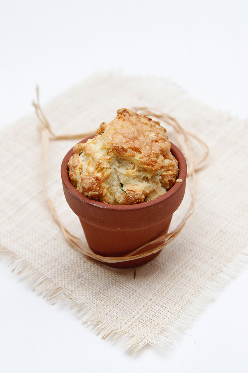 Cheese and Chive mini loaf in a terra cotta pot
